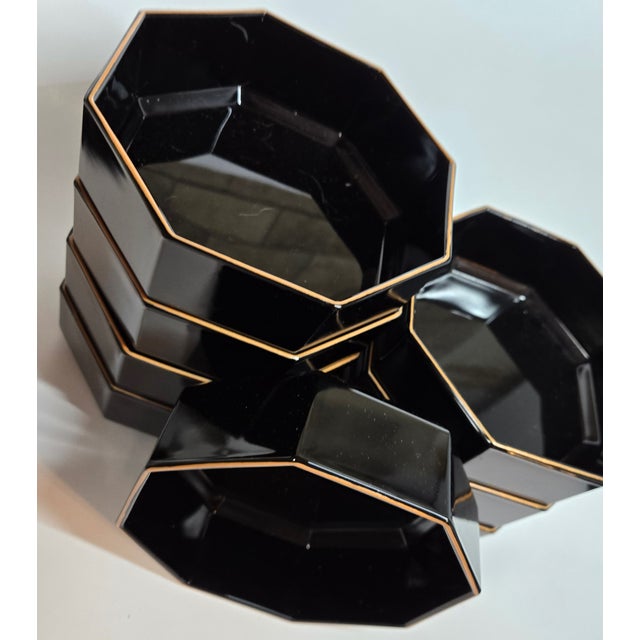 Sleek Black opaque glass in a rarely found gold rimmed beauty- late 20th century octagonal soup or cereal bowls. This is...