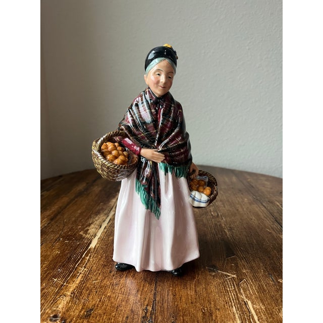 Royal Doulton Made in England Figurine Made in Porcelain Designer: Leslie Harradine *HN1759 "The Orange Lady" (1936-1975)...