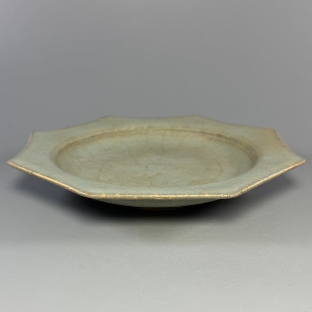 Fine antique Chinese celadon octagonal plate. Elegant foliate octagonal rim, covered in natural crackled celadon glaze,...