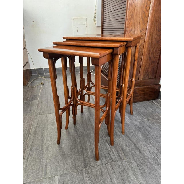Art Nouveau nesting tables, set of 3, circa 1910, probably Thonet Bentwood, stained beech Wood-finished and restored...