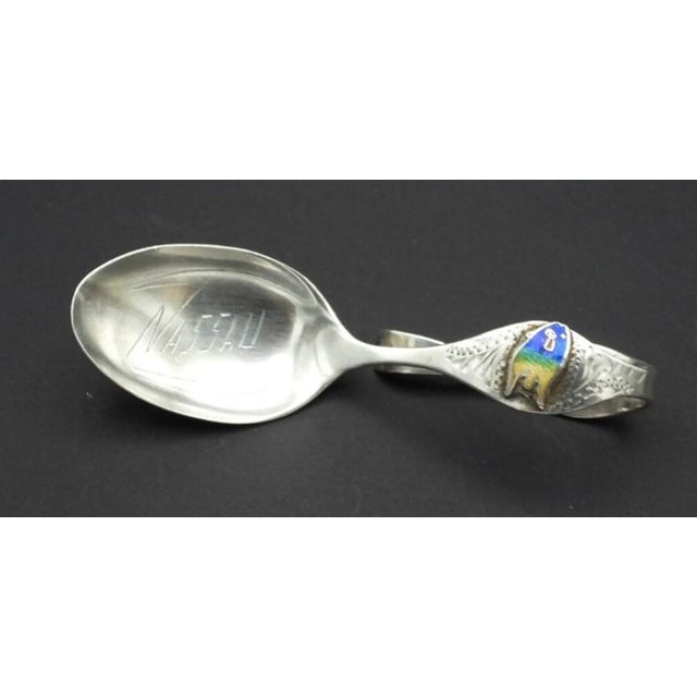 This charming dipping, jam or baby spoon is created in gorgeous sterling silver with a beautiful tropical fish in...