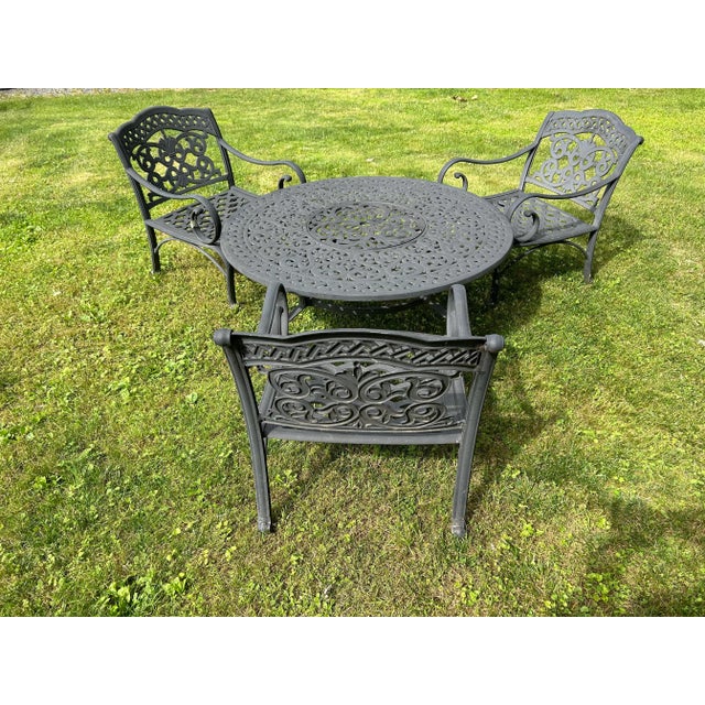 Perfect addition to your outdoor space! The table measures 52x21.5 and the chairs measure 26x27x33.5 Originally over...