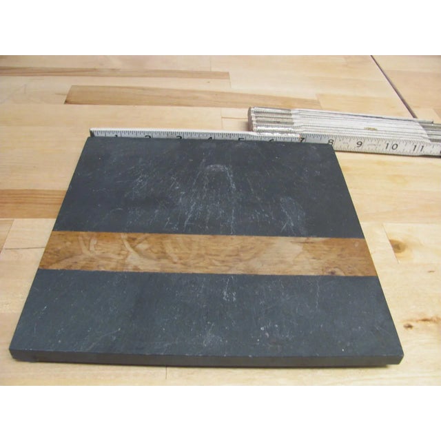 Very nice 8" square slate and walnut trivet by Harpswell House of Maine. This design is often attributed to a...