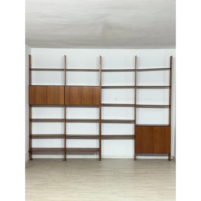 For sale is this high-quality, modular wall shelving system from the renowned manufacturer interna, designed by Peter...