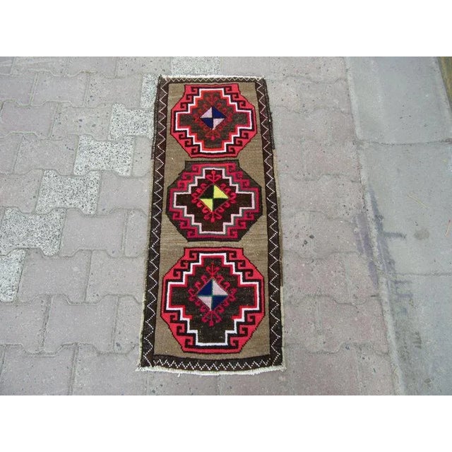 Handknotted vintage rug from kars region of turkey. Approximately 45-55 years old.In very good condition.