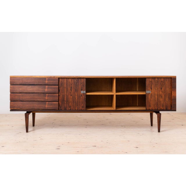 This gorgeous Mid Century Modern Sideboard was designed by Henry Walther Klein, dating from the 1950s. Crafted by Bramin...