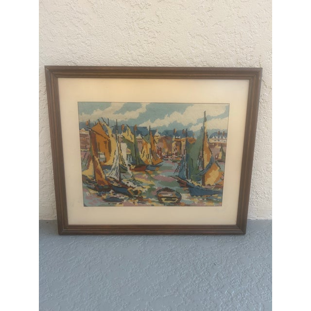 Hand made needlepoint vintage abstract sailboat painting framed with glass. Interesting artwork from the mid century