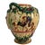 This wonderfully unusual late-19th-century Continental European faience vase is richly decorated with molded putti, hand-...