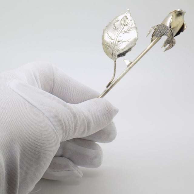 Elegant vintage object depicting a rosebud with a long stem, handcrafted in Florence between the 1980s and 1990s in...