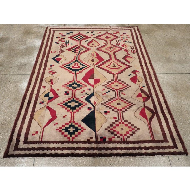 A vintage Turkish Anatolian tribal accent rug handmade during the mid-20th century. Measures: 6' 7" x 8' 11"