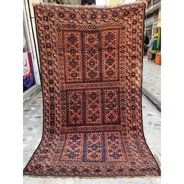 This rare antique hand-knotted wool area rug showcases a highly collectible Turkmen Yaqub Khani design. The unique center...
