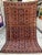 This rare antique hand-knotted wool area rug showcases a highly collectible Turkmen Yaqub Khani design. The unique center...
