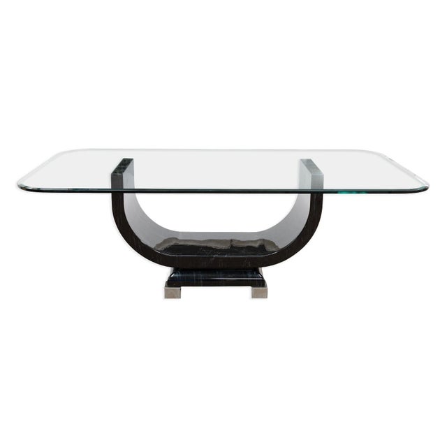 This Art Deco dining table features a sculptural black lacquer base with a semi gloss finish that highlights the gentle...