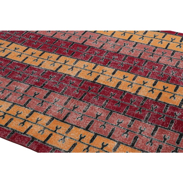 Hand-knotted in wool and originating from Turkey circa 1960 – 1970, this 5x8 vintage Zeki Müren rug is a unique addition...