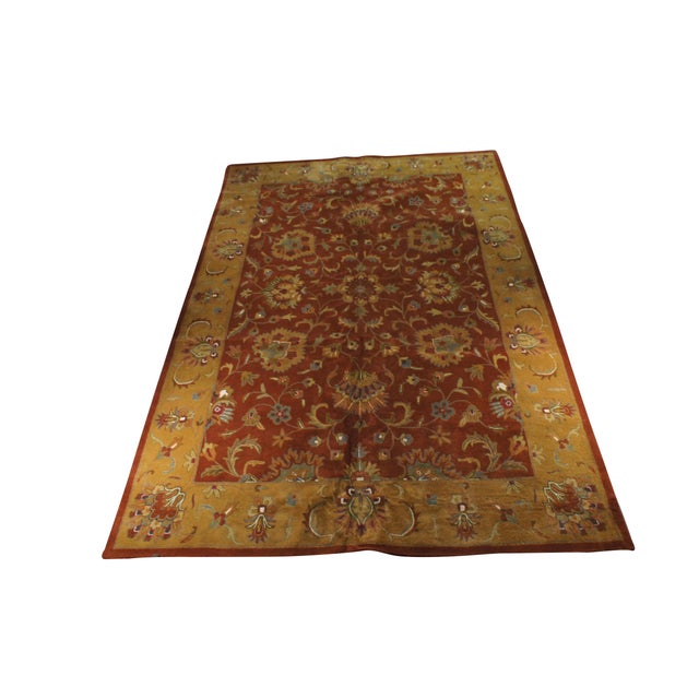 This Safavieh Heritage 820 area rug features a striking all-over geometric floral design. Woven from premium wool, this...