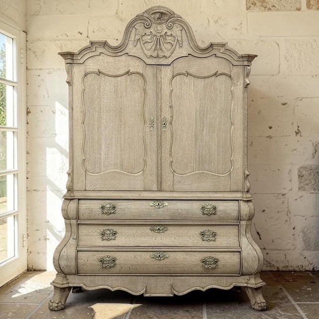 Dating to the 18th century, this exceptional Dutch linen press is a wonderful celebration of Baroque cabinetmaking, where...