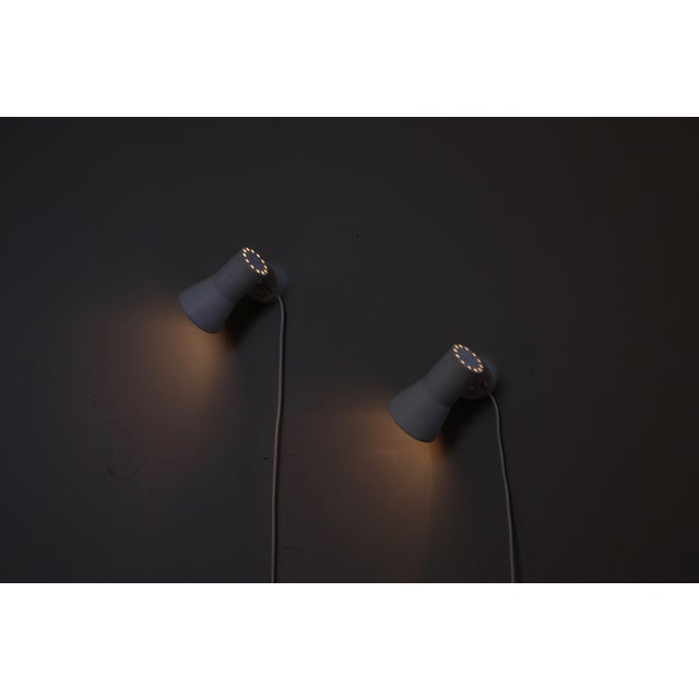 This set of two wall lamps was produced by Hans-Agne Jakobsson in Markaryd, Sweden. It is in original condition. Up to...