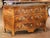 This elegant antique French commode Bordelaise, also known as a commode tombeau, was crafted in Bordeaux, France, circa...
