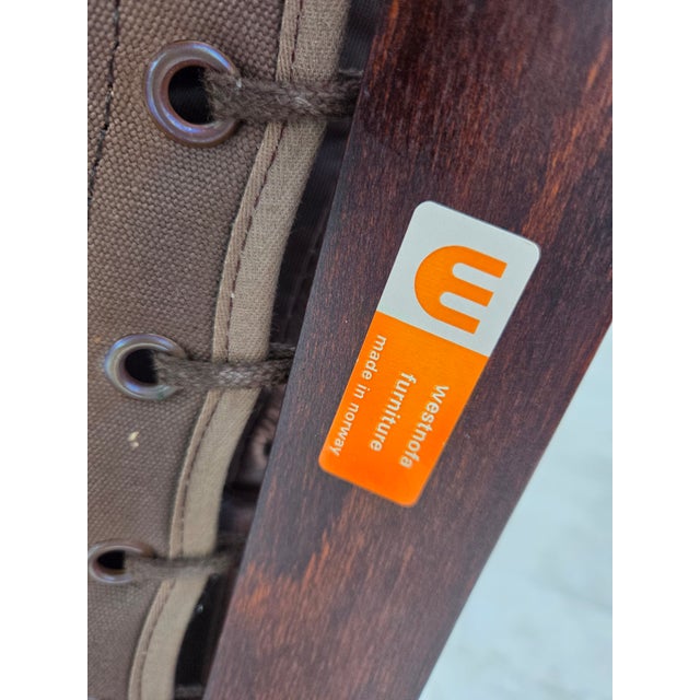 1970s, Norwegian design by Ingmar Relling for Westnofa, model "Siesta". Light brown furniture leather, bent beech wood,...