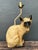 This charming vintage table lamp is a quintessential example of mid-century figural decor, blending whimsical kitsch with...