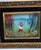 Sweet enameled painting on copper. Playful child with a toy sailboat on the water on a fine autumn day. Signed Fleming....