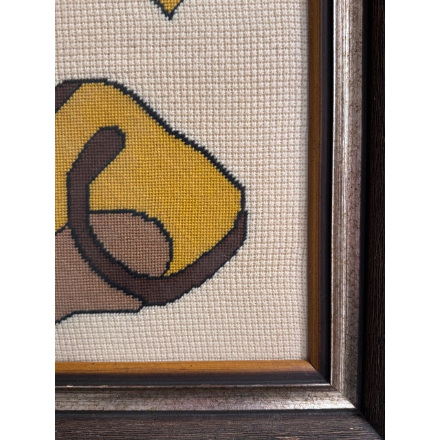 Striking vintage Judaica needlepoint featuring a stylized Lion of Judah alongside an interlocking Star of David. Worked in...