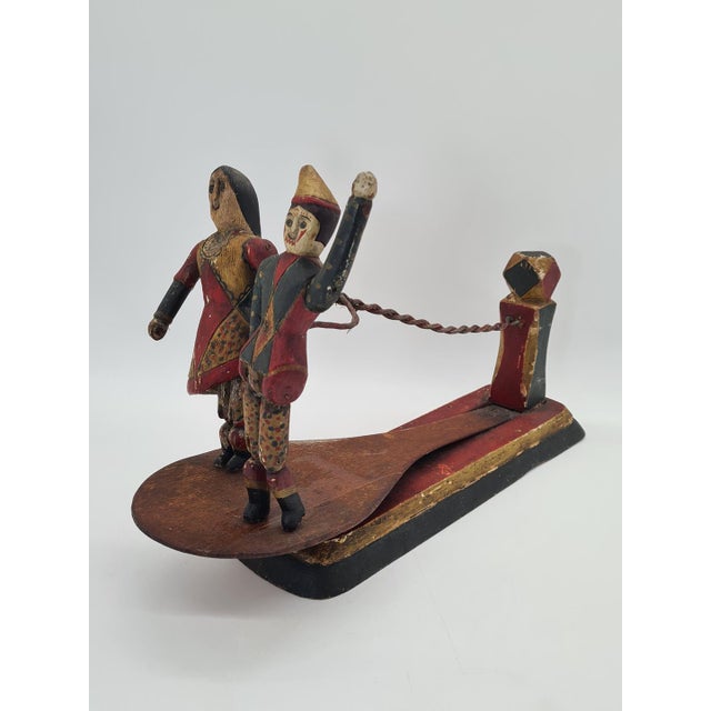 I am offering a unique, handcrafted folk toy featuring a pair of dancers. The piece is made of wood and hand-painted. The...