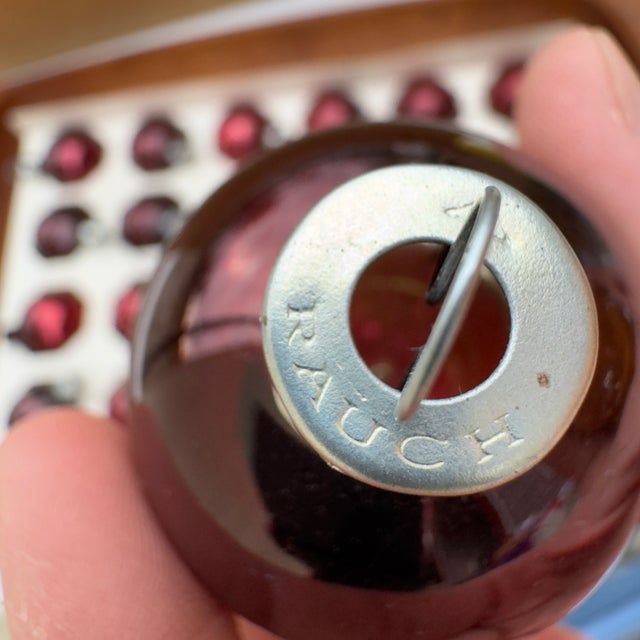 Lot of 24 Rauch mercury glass ornaments in burgundy or dark red or maroon. All 24 ornaments are in fantastic condition....