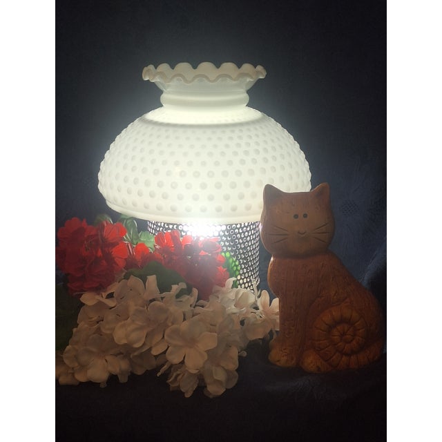 Vintage white milk glass lamp shade featuring a classic hobnail pattern and elegant ruffled edge. This substantial shade...