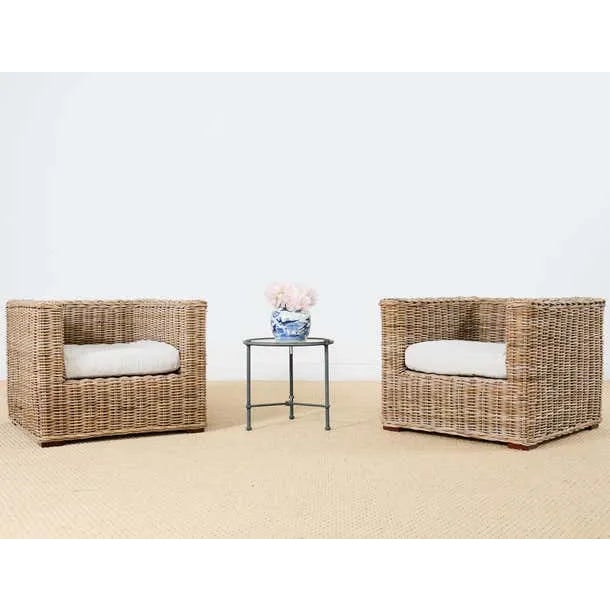 Stylish pair of rattan wicker cube lounge chairs made in the California coastal organic modern style of Michael Taylor....