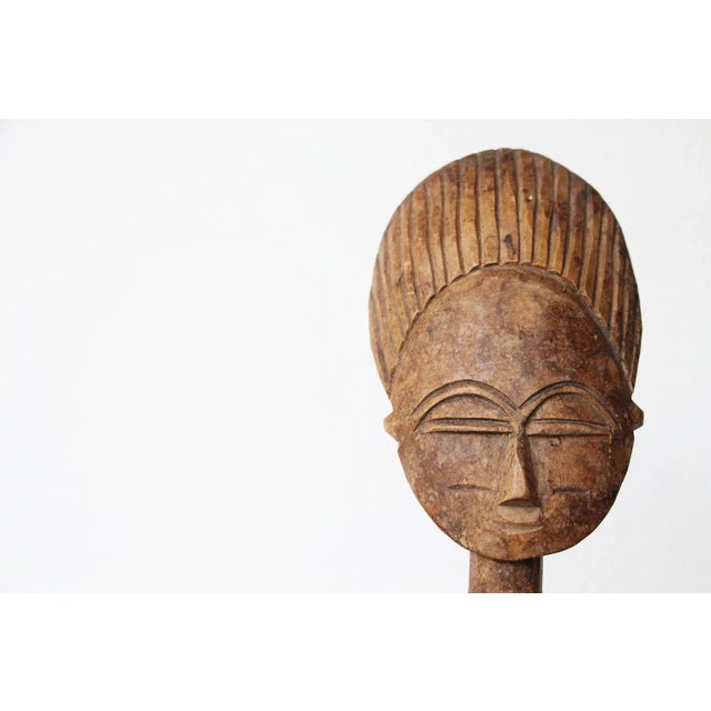 Literature. Disk-headed akuaba figures remain one of the most recognizable forms in African art. Akua ba are used in a...