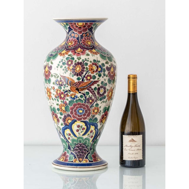 This monumental set of vintage Dutch Delft vases showcases the exuberant Chinoiserie flair of mid-century ceramic...