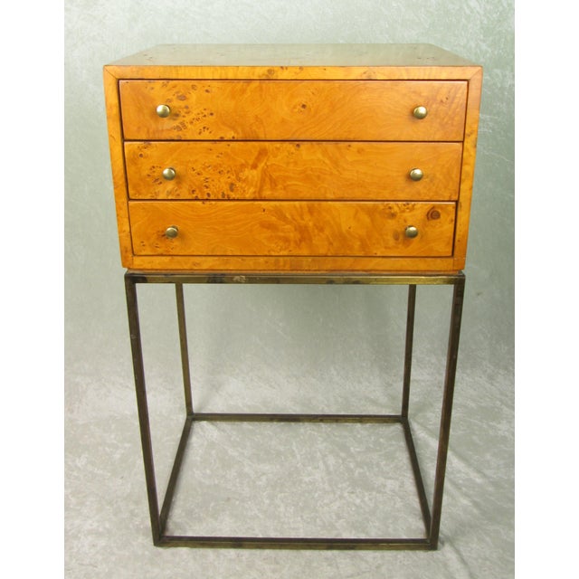 Vintage mid century modern 3 drawer jewelry chest in burlwood with attached metal stand. The piece does not have a maker...