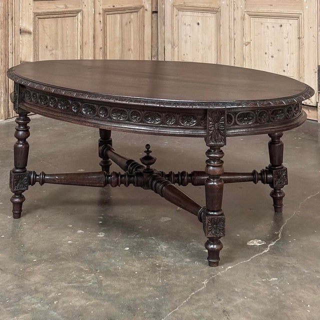 19th Century French Louis XVI Oval Coffee Table is a masterwork of the classical style! Crafted from fine French walnut,...