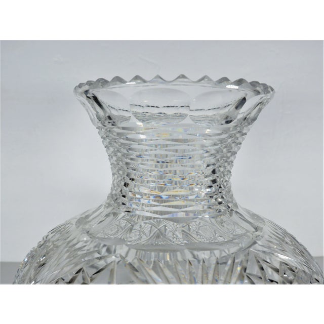 An early 1900 (1901) large American cut glass vase. Starburst and rib pattern. Starburst pattern on all sides. Concentric...