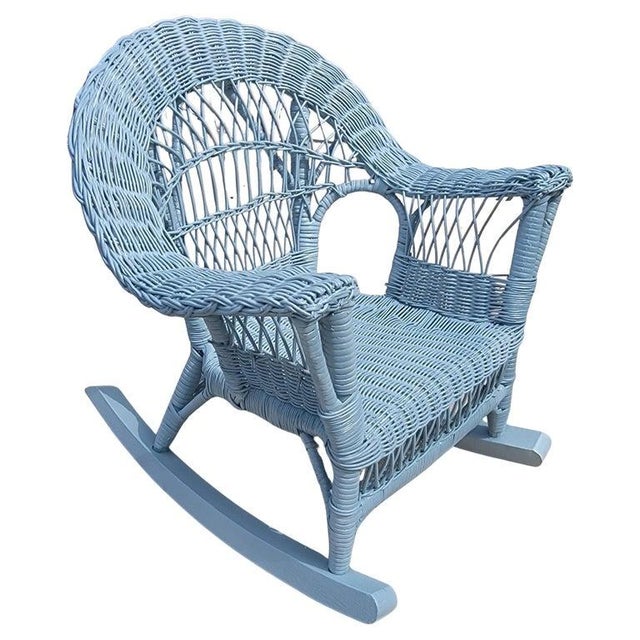 Fan back Early 20thc Bar Harbor Wicker Child Rocker. Wonderful blue painted wicker. The seat cushion was custom made for...