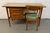 Bring timeless Mid-Century Modern style to your home, office, or study with this authentic 1960s Heywood-Wakefield student...