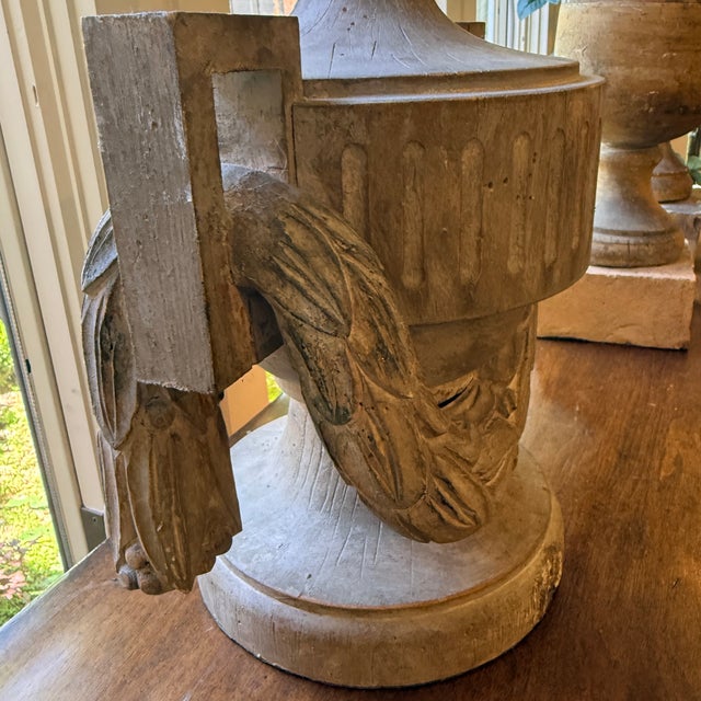 Bliss Studio Carved Wood Neoclassical Urn Lamp The urn style washed wood base is carved with neoclassical leaf and berry...