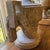 Bliss Studio Carved Wood Neoclassical Urn Lamp The urn style washed wood base is carved with neoclassical leaf and berry...