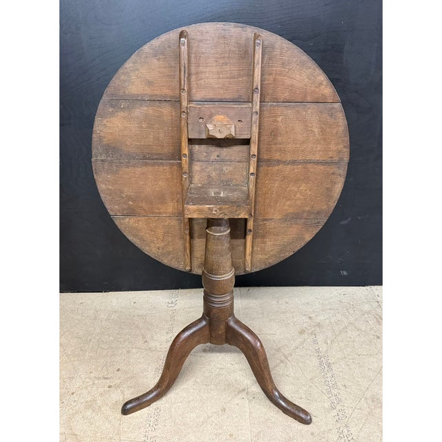 Georgian Oak Tilt Top Table having a nice warm colour and original patina. In excellent original condition for the home....