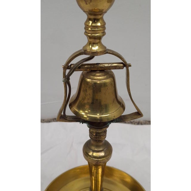 This is a vintage brass bouillotte desk lamp, from the mid-20th century or late 20th century. Features a candlestick-style...