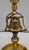 This is a vintage brass bouillotte desk lamp, from the mid-20th century or late 20th century. Features a candlestick-style...