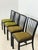 For sale is a set of four vintage dining chairs from the 1960s. The chairs impress with their simple, elegant design,...