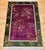 Striking and elegant, this vintage Chinese Art Deco area rug features an allover floral pattern set against a rich royal...