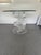 Striking vintage 1980s sculptural Lucite dining table featuring a dramatic helical “twist” base constructed from...