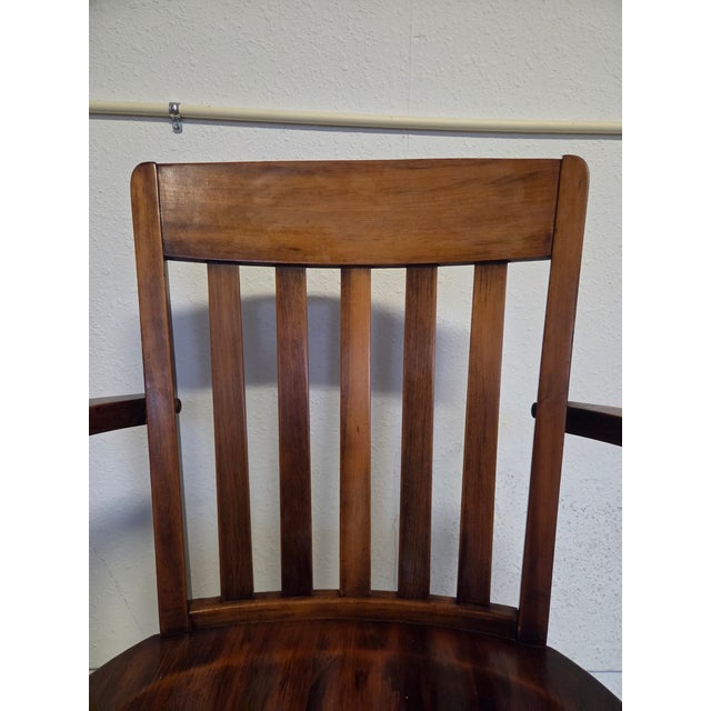 A true banker’s chair has a presence you can feel—substantial, authoritative, and quietly elegant. This Murphy 223 chair...