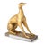 Perched atop a crystal pedestal, this pair of left and right facing dogs, are finished in antiqued gold leaf and perfect...