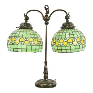 Tiffany Studios Arts & Crafts Bronze Double Arm Student Lamp With Stained Leaded Glass Acorn Shades For Sale