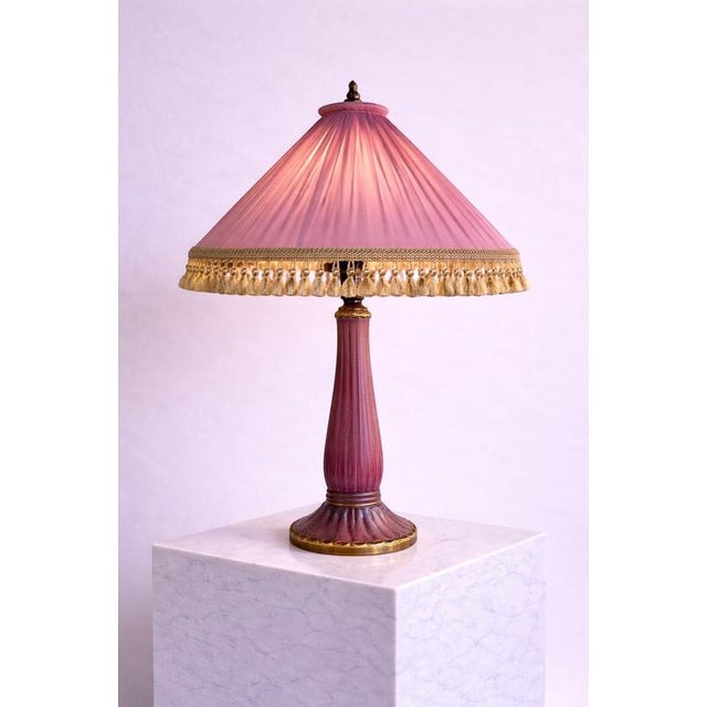 An exceptional and rare Swedish Art Deco table lamp designed by Josef Ekberg and produced at the renowned Gustavsberg...