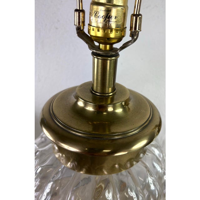 This is an elegant pair of handblown glass table lamps by Frederick Cooper. These lamps have beautifully hand blown glass...